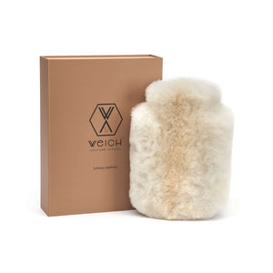 Wärmflasche CALMO Luxus Geschenk in edler Geschenkverpackung in unterschiedlichen Größen und Varianten. Wärmflaschenbezug aus Alpaka